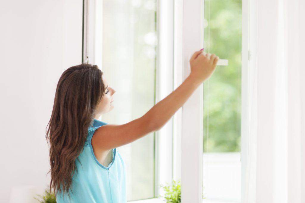 Girl-opening-window